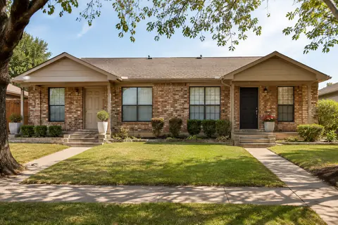 Residential duplex entrance and its exterior walkway, illustrative image